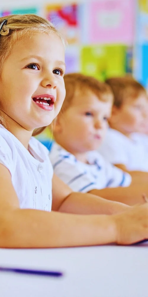 Kids playing with toys on the floor
